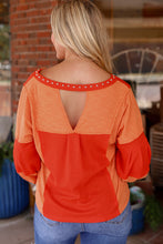 Load image into Gallery viewer, Fiery Red Studded V Neckline Exposed Seam Textured Knit Top
